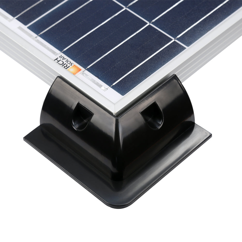 Corner bracket underside showing the adhesive contact area