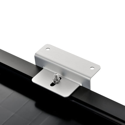 Z-brackets holding a solar panel above a flat roof surface